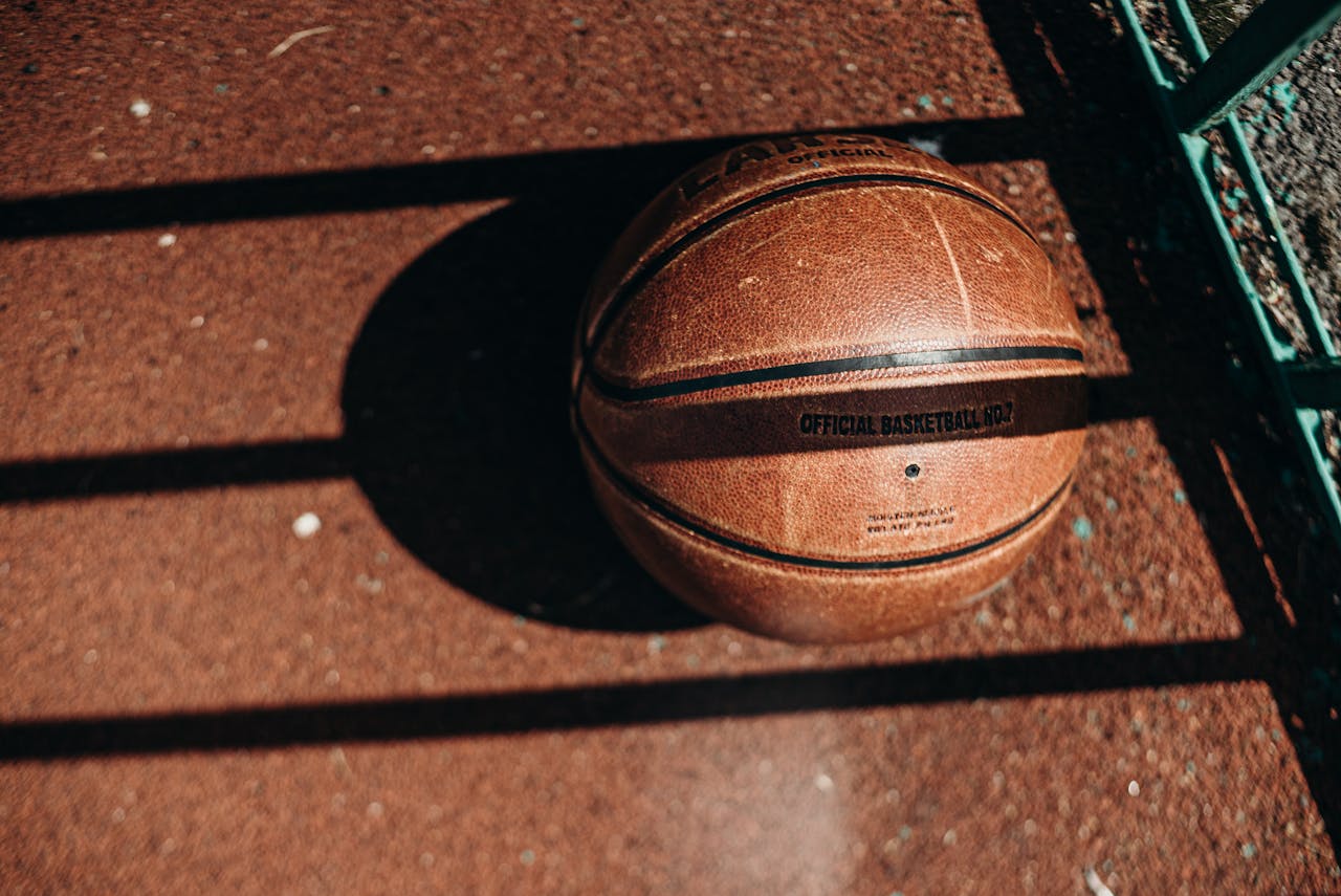 Brown Basketball on Brown Concrete Floor